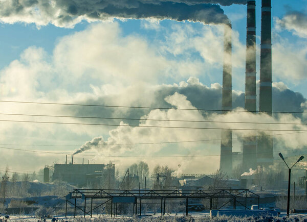 Pipe with smoke. Heat energy network. CHP. combined heat and power, a system in which steam produced in a power station as a byproduct of electricity generation is used to heat nearby buildings.