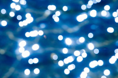 Doku arka plan. Gauss bulanıklığı tasarımcıları için uygundur. Havuzda su sayacı ışığında fotoğrafı