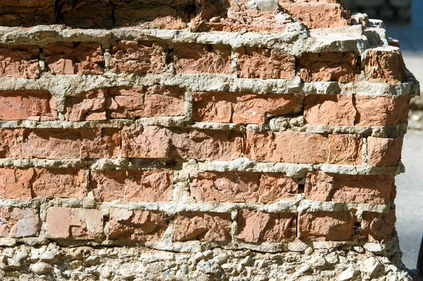 Texture, background. brick old plaster. old grunge brick wall with space for text. Brick old wall texture for background. background texture from brick wall with cracked plaster
