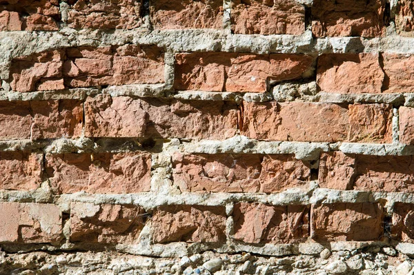 砖老石膏 旧的粗糙的砖墙与文本的空间 砖旧墙纹理的背景 背景纹理从砖墙与破裂石膏 — 图库照片