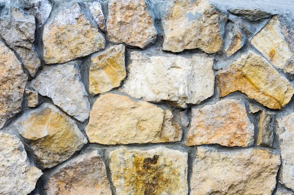 Текстура, фон. Фон. Дикая каменная стена. sandston — стоковое фото