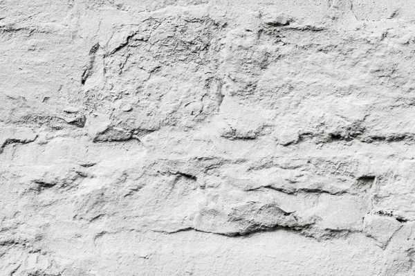 Textura, fondo. Antecedentes Piedra salvaje cubierta de blanco p — Foto de Stock