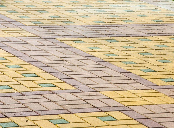 Texture, background, colorful area lined with paving slabs — Stock Photo, Image