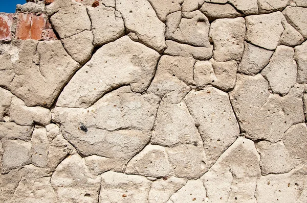 Texture of old plaster. On the wall of old plaster