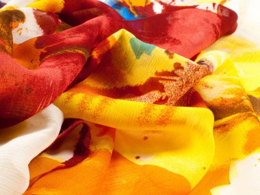 Kumaş ipek doku kahverengi, mavi, beyaz ve sarı. Fotoğraf stüdyosu