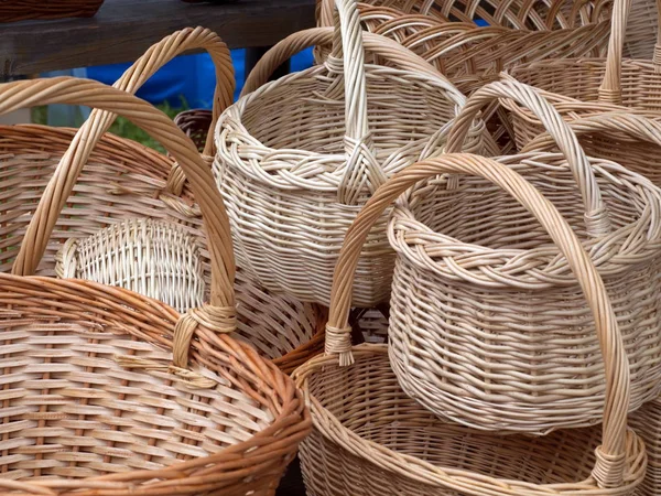 Wicker is a material made of plant stalks, branches or shoots formed by a kind of weaving into a rigid material, basket, pannier, car, chip basket, corf, nacelle