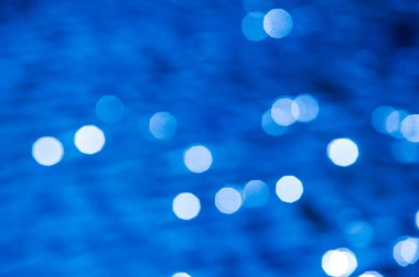 Doku, desen, arka plan. Gauss bulanık görüntü. Su üzerinde güneşin yansıması. Su üzerinde güneş ışığı