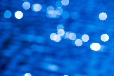 Doku, desen, arka plan. Gauss bulanık görüntü. Su üzerinde güneşin yansıması. Su üzerinde güneş ışığı