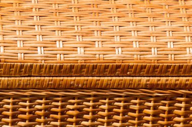 doku, arka plan. Willow twigs hasır öğeleri. Sepetler, göğüsler. Mücevher tasarımcısı interera