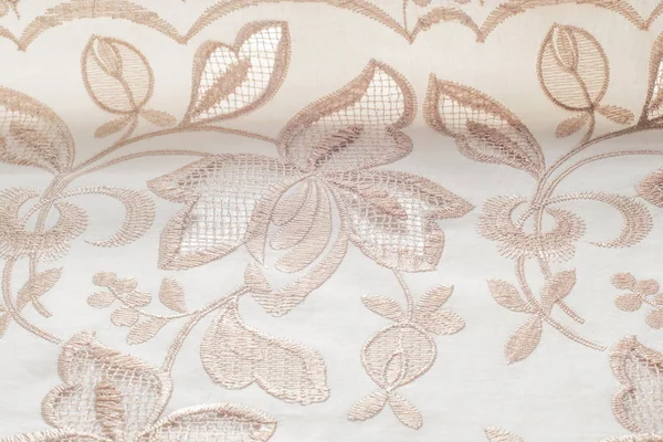Texture lace. a fine open fabric, typically one of cotton or silk, made by looping, twisting, or knitting thread in patterns and used especially for trimming garments. — Stock Photo, Image