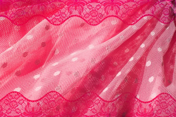 布花边织物背景上亮片的纹理 为一体的很多人在装修衣服上缝的闪亮的小磁盘 热粉红 樱桃木色 — 图库照片