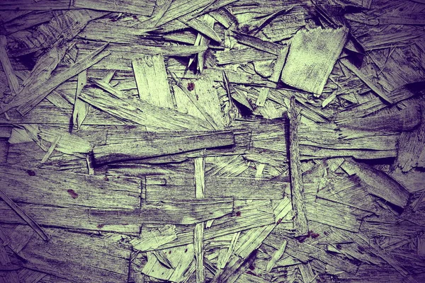 Vintage processing. Texture, background. Fiberboard. stiff board made of compressed and treated wood pulp. old.
