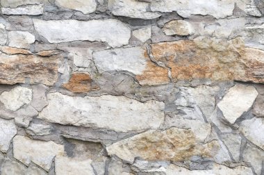 Kusursuz doku, arka plan, granit duvarlarla kaplı taş. Kum taşı. Taş zemin duvarı. Yüzleşen Taş