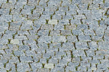 Sorunsuz doku, arka plan. Granit kaldırım. Döşeli veya kaplı asfalt karayolu sokak.
