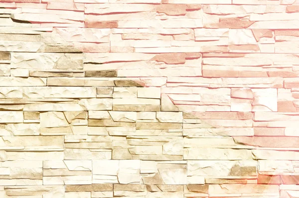 Texture, background, pattern. Natural stone lined wall. Hard rock chunks or solid mass, as well as a piece, vertical part of the building premises.