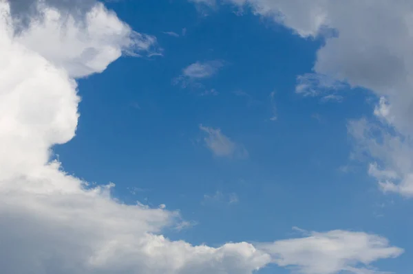 Texture, background. Clouds, sky photographed from a helicopter. a visible mass of condensed water vapor floating in the atmosphere, typically high above the ground.