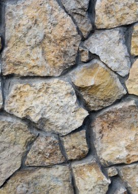 Doku, arka plan. Vahşi taş, granit, kum ile kaplı çit