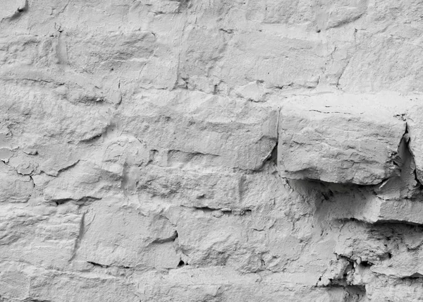 Textura Fundo Uma Parede Forrada Com Pedra Caiada Branco — Fotografia de Stock