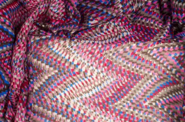 Doku, arka plan, desen. Bir yün yün kartı Missoni renk. Beyaz, kırmızı, kahverengi, siyah. Soyut çizim.