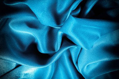 Doku, arka plan. şablon. İpek kumaş mavisi, mavi ipek kumaş ve avludaki döşeme kumaşı - koyu perdeler - sırt ve yastıklar için katı kumaşlar