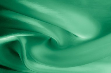 Doku, arka plan, desen. Soluk yeşil ipek kumaş. Bu pek de yumuşak ve ince tül, yumuşak ipek tül var. Görünüşe göre bir perdelik, bir düğün hayal çok yumuşak