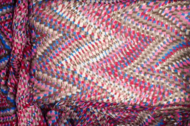 Doku, arka plan, desen. Bir yün yün kartı Missoni renk. Beyaz, kırmızı, kahverengi, siyah. Soyut çizim.