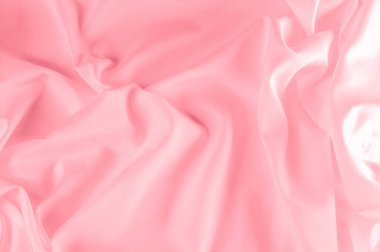 arka plan doku. ipek kumaş pembe. Bu toz pembe ipek dokuma bahar romantik bir hava verir. Onun nazik sesi yapım o pürüzsüz ve parlak saten gibi yüz sunar. 