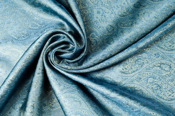 Background texture, pattern. Blue paisley silk chiffon mod fabric by the yard. Crinkled, flowy, soft, very light,