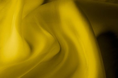 Doku, arka plan, desen. Sarı şeffaf ipek kumaş. Güneş Sarı ipek Charmeuse saten, 