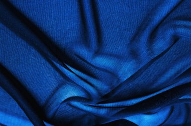 Doku, arka plan, desen. Mavi şeffaf kumaş. Kristal Organze bir grenli Parlatıcı ve bir daha düzgün Parlatıcı/yansıma ve hissediyorum vardır ayna Organze için karşılaştırıldığında hissediyorum vardır.