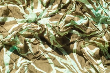 Doku, arka plan, desen. Kadın etek. Kumaş Pamuk koruyucu renk haki. Mat kahverengi-sarı renkli, özellikle, bir güçlü pamuk kumaş tekstil kumaş olduğunu