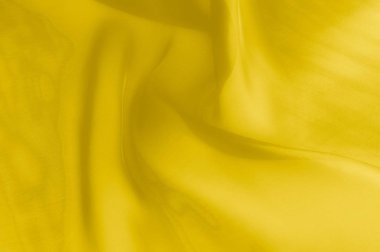 Doku, arka plan, desen. Sarı şeffaf ipek kumaş. Güneş Sarı ipek Charmeuse saten, 