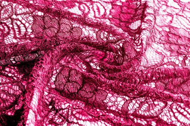 Doku, arka plan, desen. Kumaş kırmızı dantel. Arka planını dantel kumaştan gül stilize. Çiçekli soyut dantel modeli. Duvar kağıdı, iç çamaşırı ve takı. Davetler