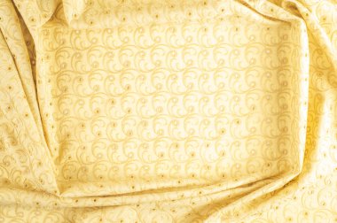 Doku duvar kağıdı. İşlemeli desenli kumaş hafif bej renk delik yumruk attı. Geniş deliği pamuk dantel kumaş tarafından bahçeye