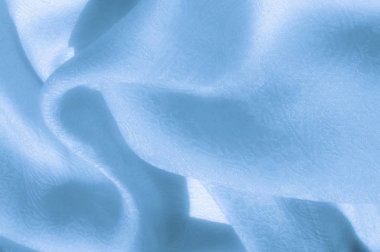 Doku, arka plan, desen. Kumaş - ipek ışık. Soluk mavi col