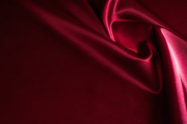 Doku, arka plan, desen. Kırmızı ipek kumaş. Bu saten kumaş 