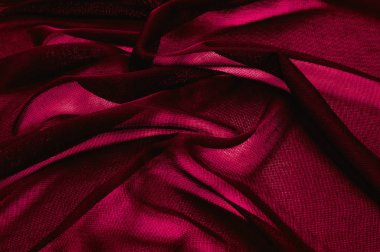 Doku, arka plan, desen. Kırmızı şeffaf kumaş. Organze Si