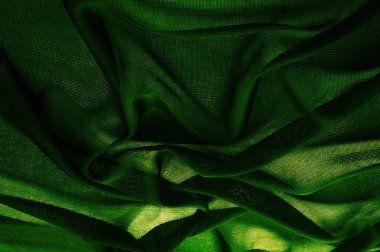 Doku, arka plan, desen. Yeşil şeffaf kumaş. Katı Merhaba