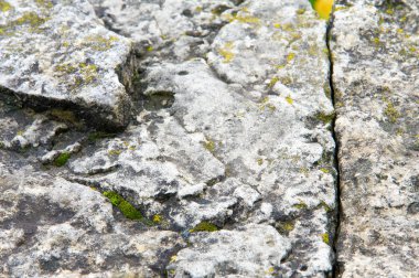 Doku, arka plan, desen. Eski granit taşlar. Eski bir taş w