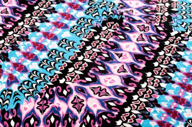 Doku, arka plan. örme kumaş. mavi kırmızı siyah desen. deniz mavisi yeşil mavi, takımları kahverengi ve hafif pamuk spandex Rayonu siyah örme karışımı. Kumaş bir güzel örtüsü ve streç ile yumuşak