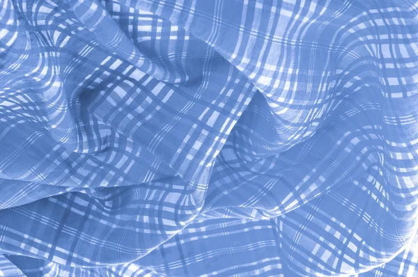 background texture. silk fabric checkered blue white Soft with a fine texture, this perfectly flowing fabric has an excellent drapery Thin, light and slightly translucent with the addition of elastane
