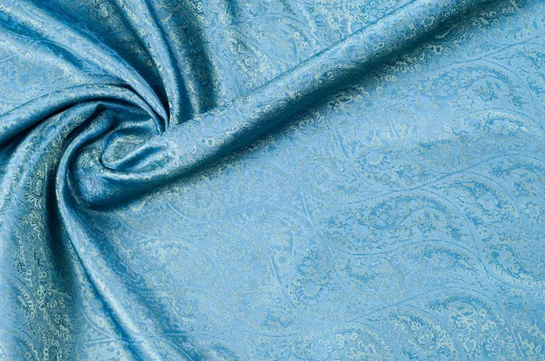Background texture, pattern. Blue paisley silk chiffon mod fabric by the yard. Crinkled, flowy, soft, very light,