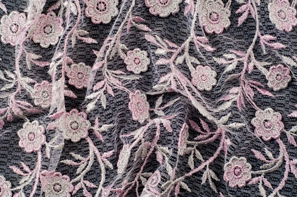 Texture, sfondo, pattern. Laccio rosa decorato con fiori o — Foto Stock