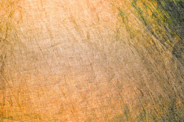 Háttér textúra, minta. Sűrű pamut típusú szövet, arany színű — Stock Fotó