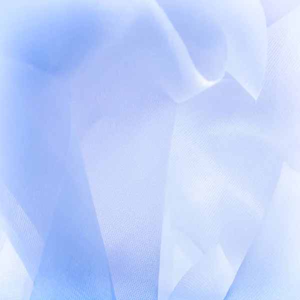 Текстура, фон, текстура шелковой ткани синяя. Si — стоковое фото