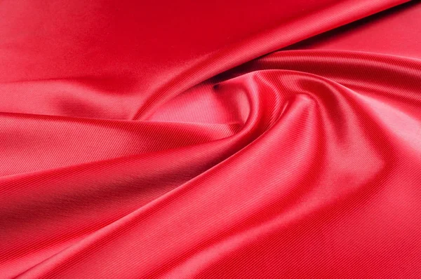 Textura, fondo, patrón. Tejido de seda roja.Este tejido de satén — Foto de Stock