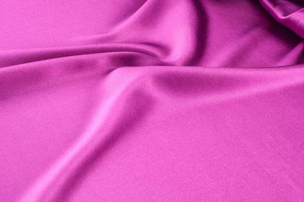 Arka plan görüntüsü, kırmızı renk ipek kumaş dokusuna. saten veya