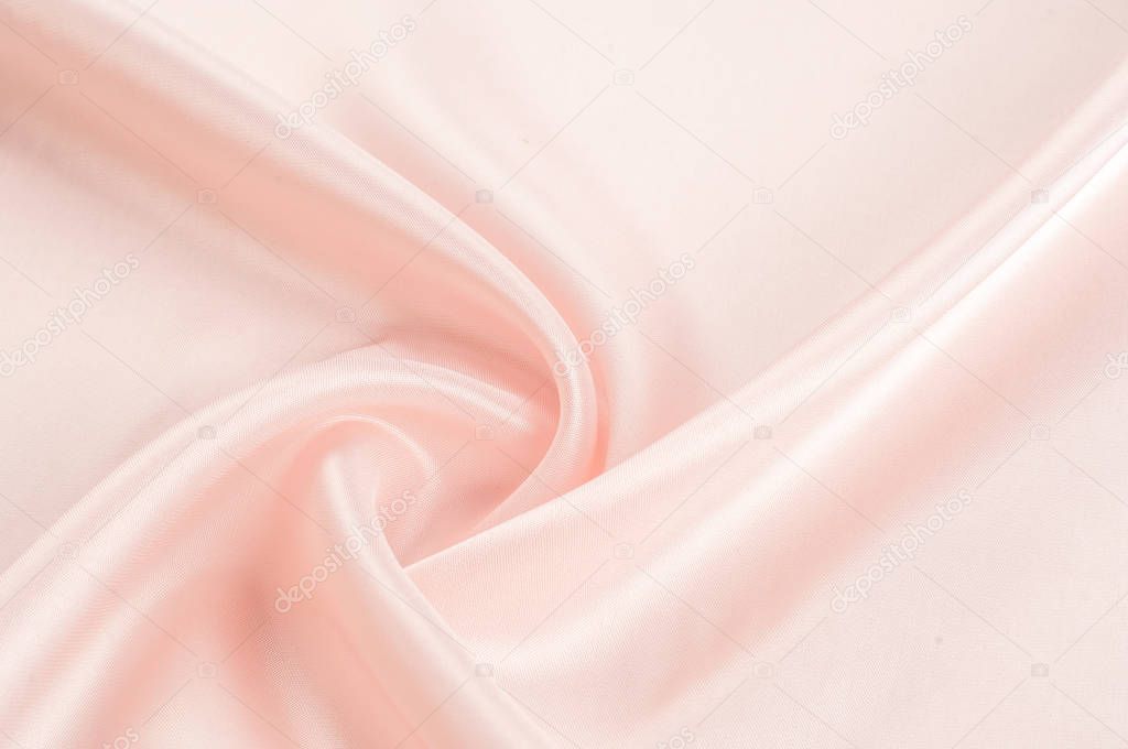 Texture, background, pattern. Fabric silk pink background. Beaut