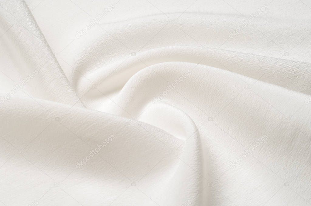 Texture background pattern. White silk fabric. Closeup of a ripp