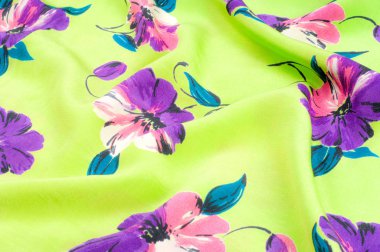 Doku, arka plan, desen. İpek kumaş - çiçeklerle yeşil. 